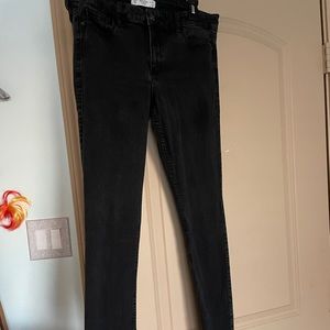 Black skinny jeans, no holes